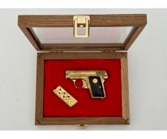 Colt 1908 24K Bright Gold W/ Blk Wood & Gold Colt Medalion Grips. 25acp